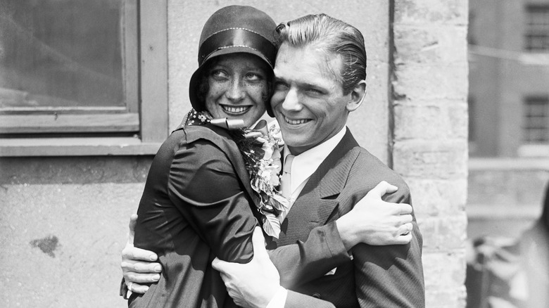 Joan Crawford smiling with husband Douglas Fairbanks Jr.