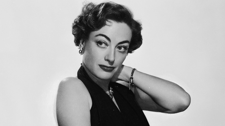 Joan Crawford posing