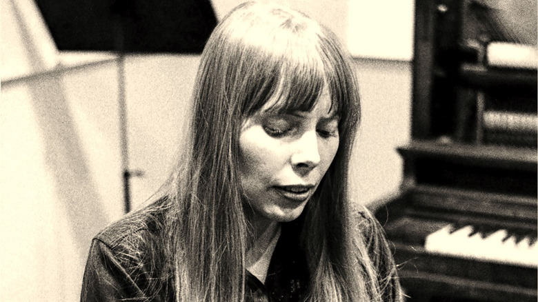 Joni Mitchell looking down 