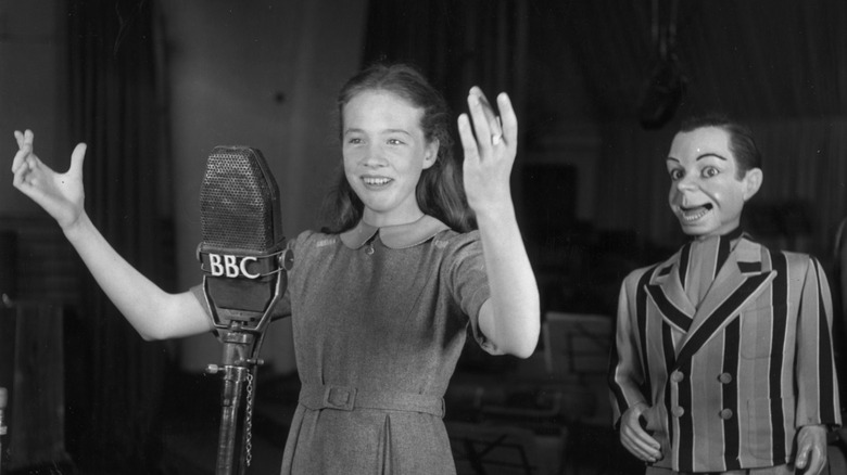 A 14-year-old Julie Andrews on a BBC mic at the London Palladium with a puppet behind her