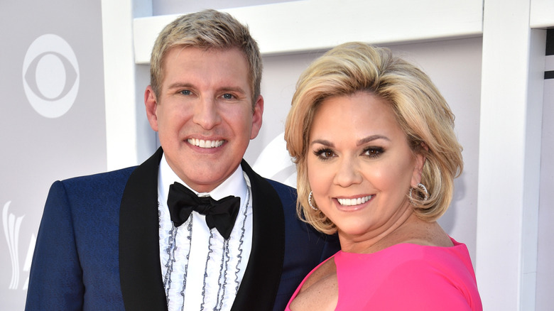 Todd and Julie Chrisley smiling at an award show