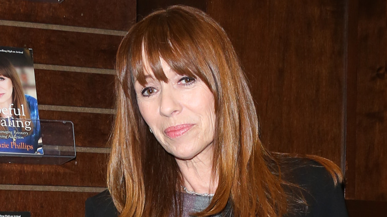 Mackenzie Phillips looking thoughtful