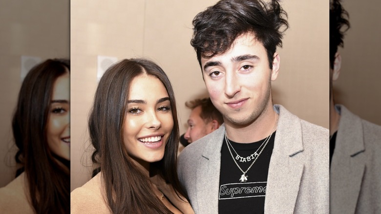 Madison Beer smiling with Zack Bia at birthday celebration