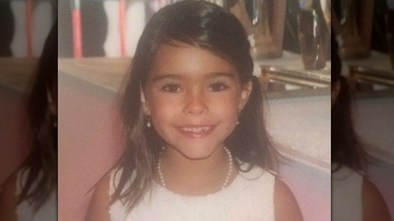 Madison Beer smiling as a kid