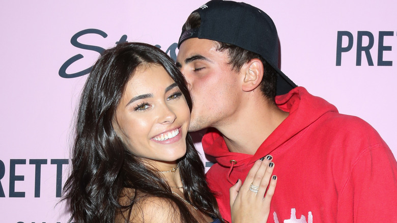 Jack Gilinsky kissing Madison Beer's cheek