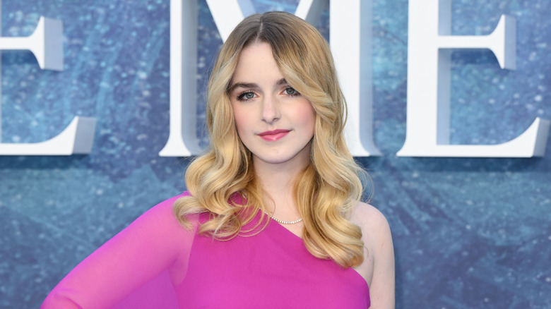 Mckenna Grace smirking hand on hip