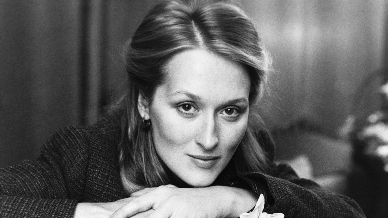 A young Meryl Streep resting on her hands