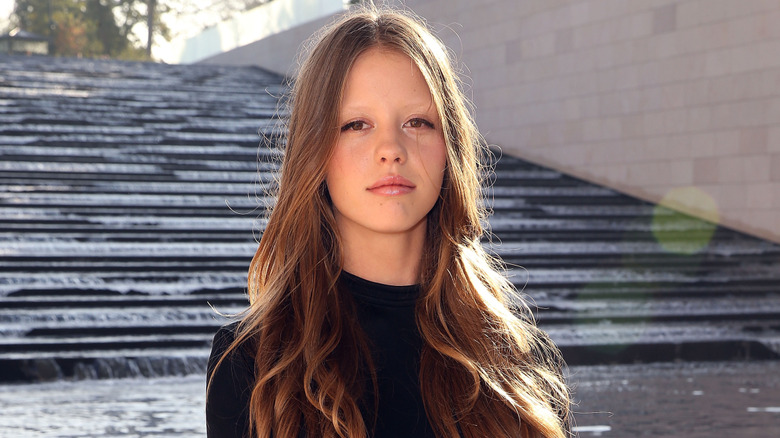 Mia Goth during Paris Fashion Week in 2014