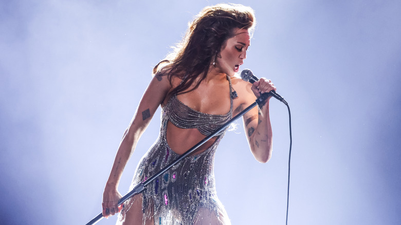 Miley Cyrus performing on stage at the 2024 Grammys