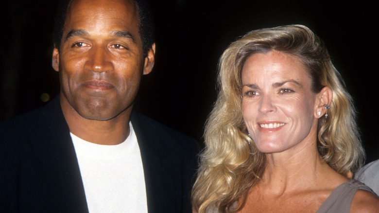 Nicole Brown Simpson and OJ Simpson smiling