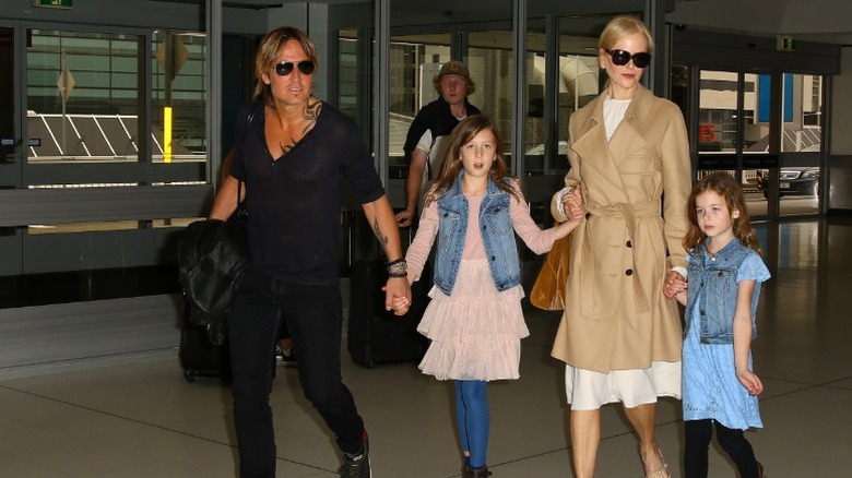 Keith Urban, Sunday Rose Kidman Urban, Nicole Kidman, and Faith Margaret Kidman Urban arrive at the Sydney airport in Australia (2017)
