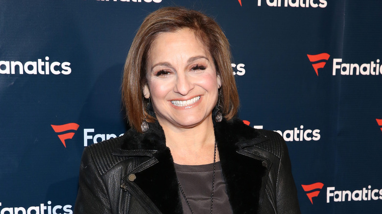 Mary Lou Retton smiling at a red carpet event