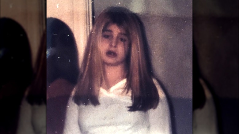 Old photo of young Kelly Osbourne with her natural hair