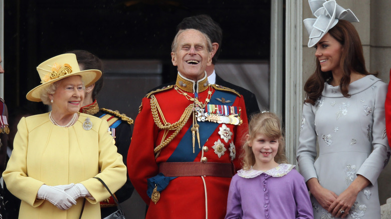 Queen Elizabeth II, Prince Philip, Lady Louise Mountbatten-Windsor, and Kate Middleton standing together