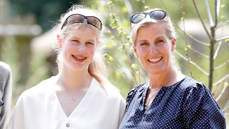 Lady Louise Mountbatten-Windsor and Sophie Rhys-Jones smiling while posing together
