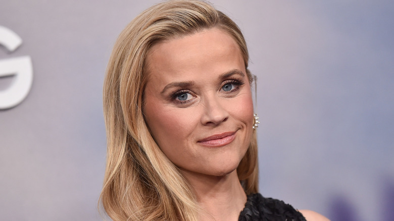 Close-up of Reese Witherspoon wearing black and smiling