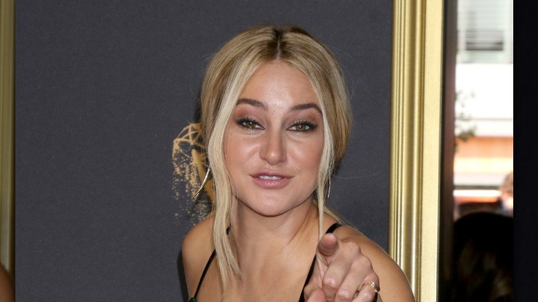 Shailene Woodley looking and pointing directly into camera