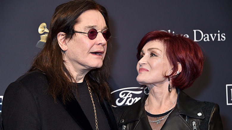 Ozzy and Sharon Osbourne posing at a red carpet event