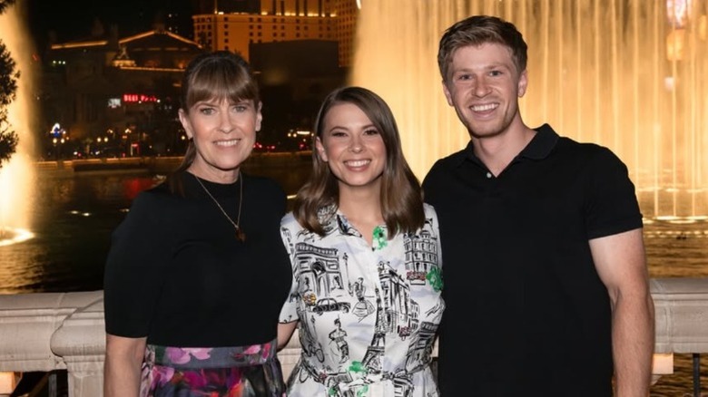 Terri Irwin, Robert Irwin, and Bindi Irwin pose for a photo in Las Vegas 2025