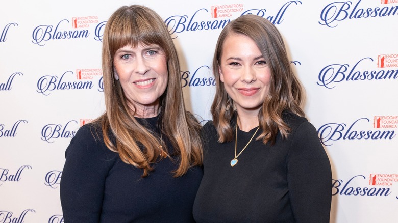 Terri Irwin and Bindi Irwin smile on a 2024 red carpet