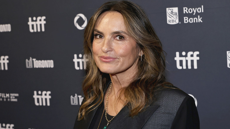 Mariska Hargitay posing at an event in a black jacket