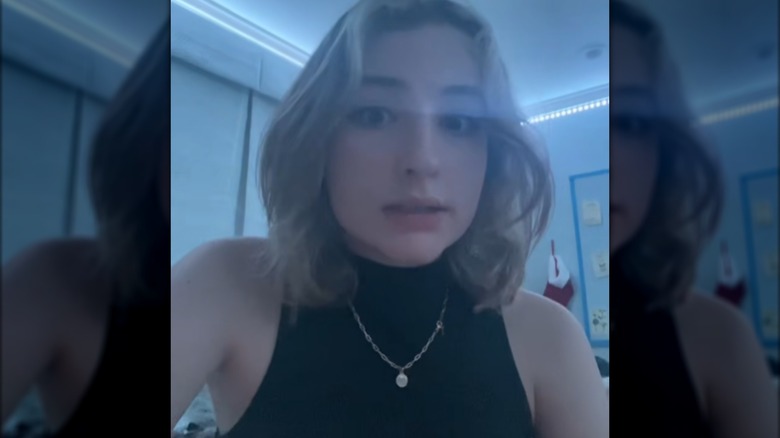 Caroline Cruz looking into TikTok camera