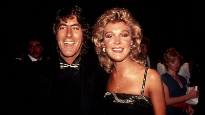 Director Kenny Ortega and Cynthia Rhodes smiling in the 1980s