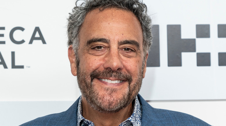 Brad Garrett smiling on a red carpet
