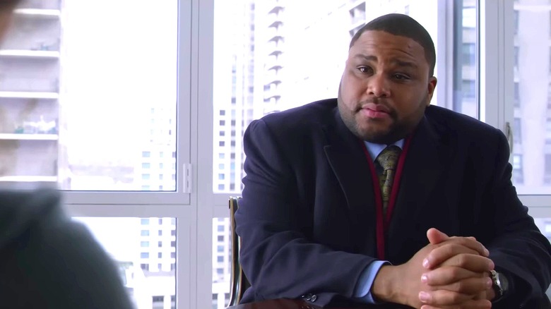 Anthony Anderson as Detective Kevin Bernard on "Law & Order" sitting in front of a big window, hands folded in front of him