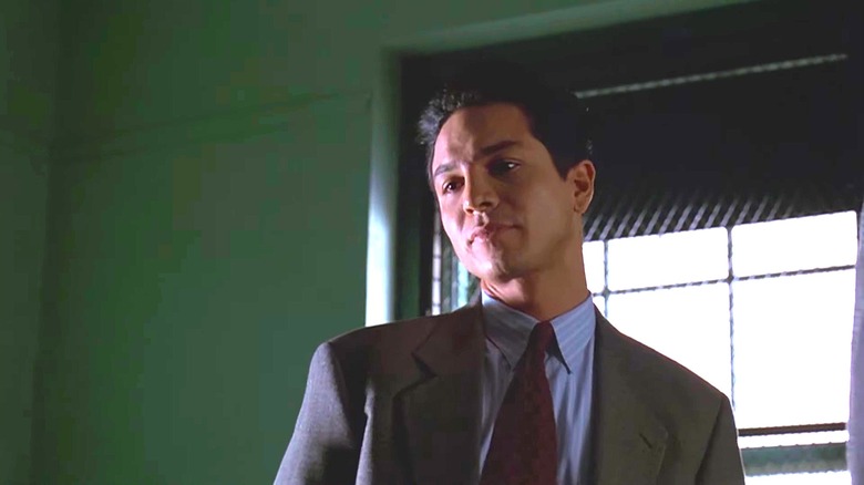 Benjamin Bratt as Rey Curtis on "Law & Order" in front of a window