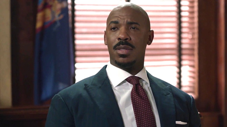 Mehcad Brooks as Jalen Shaw on "Law & Order," testifying on the stand in front of a window