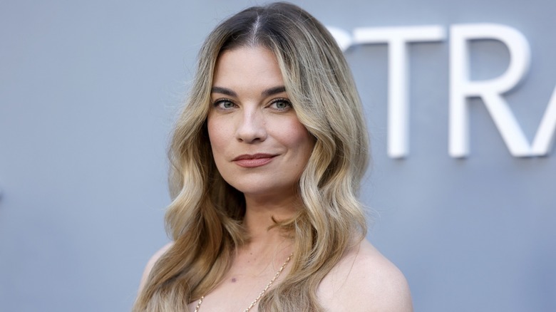 Annie Murphy smiling at the premiere of "Nine Perfect Strangers"