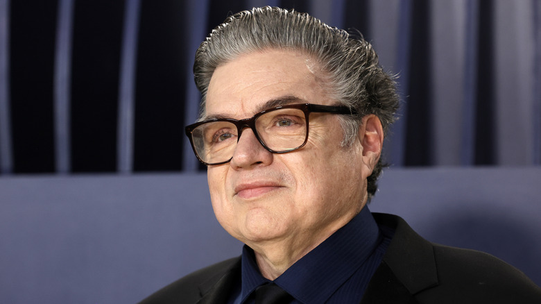 Oliver Platt wearing glasses at a premiere event