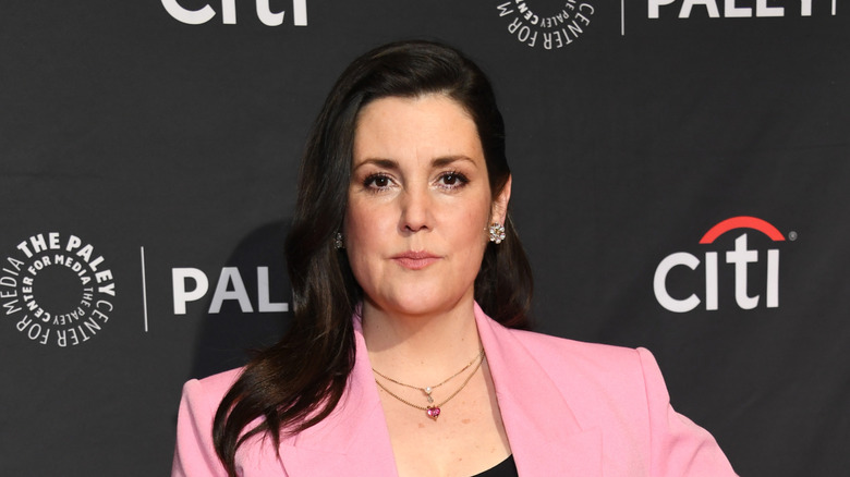 Melanie Lynskey wearing a pink suit at Yellowjackets event