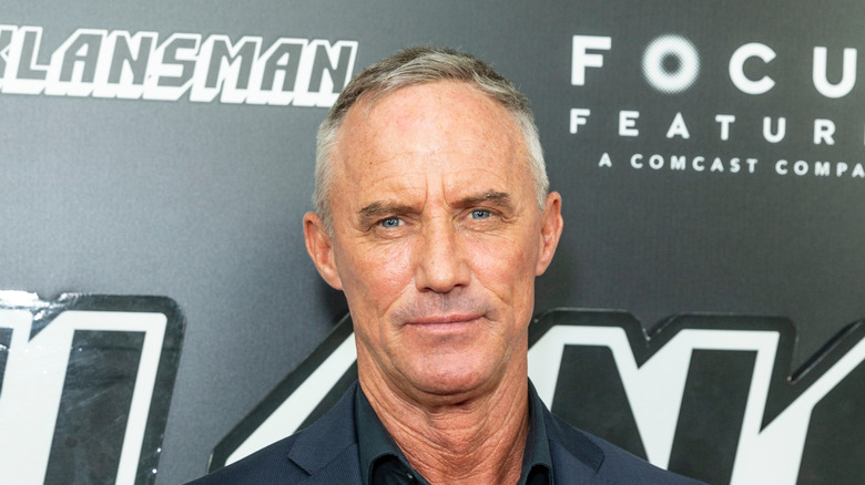 Robert John Burke posing at a premiere