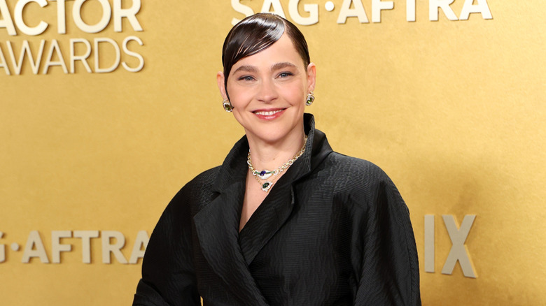 Fiona Dourif posing on step-and-repeat