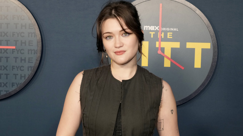 Isa Briones posing on step-and-repeat