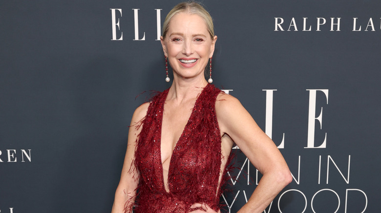 Katherine LaNasa smiling on step-and-repeat