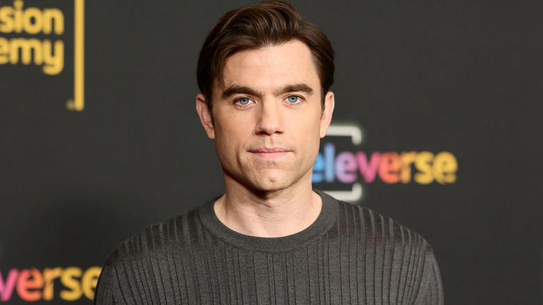 Patrick Ball posing on step-and-repeat