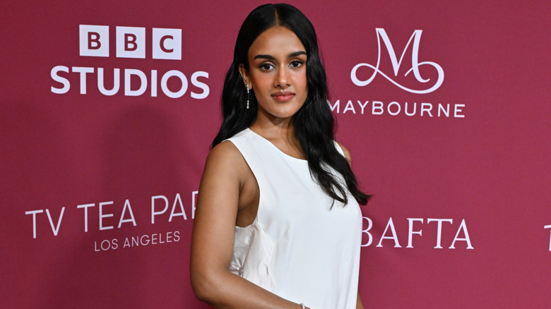 Shabana Azeez posing on step-and-repeat