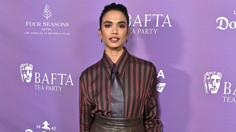 Supriya Ganesh posing on step-and-repeat