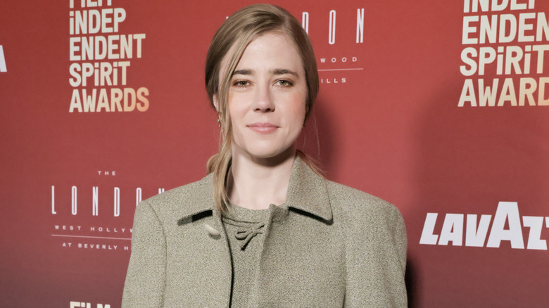 Taylor Dearden posing on step-and-repeat