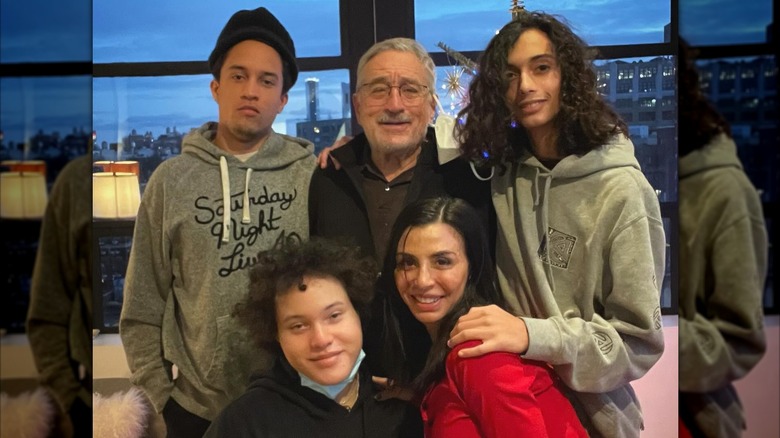 Robert De Niro with his grandchildren and his daughter.
