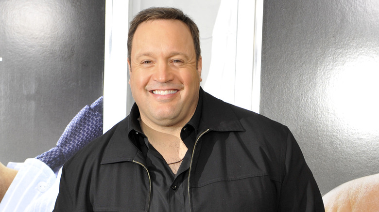 Kevin James smiling at the "Here Comes the Boom" premiere in 2012
