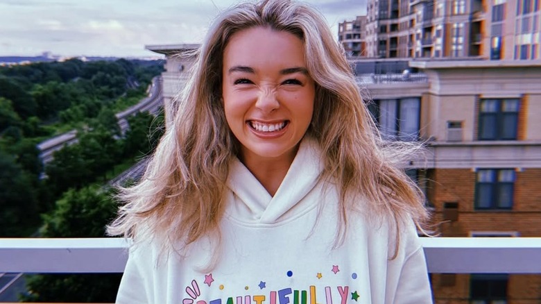 Baylen Dupree wearing a sweatshirt from her clothing line Baylen Dupree
