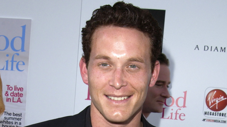 Cole Hauser smiling at a red carpet event