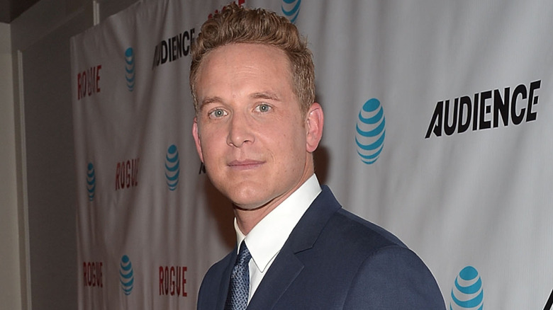 Cole Hauser posing on the red carpet at an event