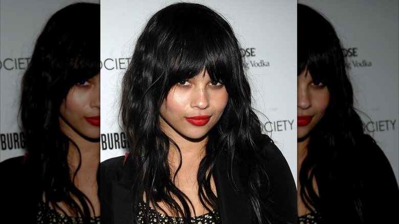 Zoë Kravitz attending a Cinema Society event with front bangs and red lipstick in 2009