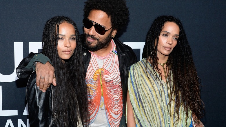 Zoë Kravitz, Lenny Kravitz, and Lisa Bonet posing at a red carpet event in 2016