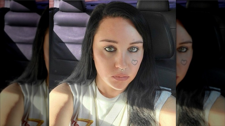 Amanda Bynes taking a selfie